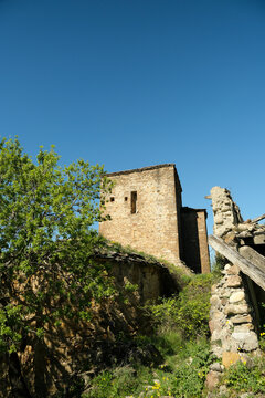 Abandoned village under the mountains and yesa lake