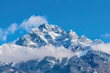 Obraz premium A majestic mountain view with snowy peaks in winter, featuring a pristine landscape and crisp, clear skies, banner, with copy space