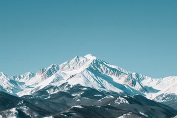 Fototapeta premium A majestic mountain view with snowy peaks in winter, featuring a pristine landscape and crisp, clear skies, banner, with copy space