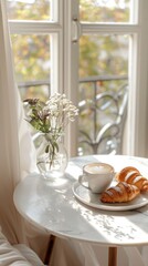 Fragrant crispy croissants on a marble board, a cup of latte and a bouquet of wild flowers