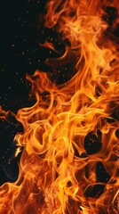 Fototapeta premium flames from a big fire against a black background