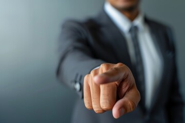 Fototapeta premium businessman finger point to empty space, front view 
