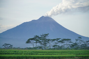 Mount Merapi emits smoke when the weather is clear