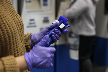 Woman hold tourniquet for providing first aid in hands