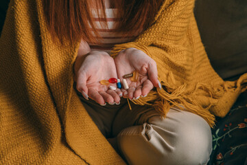 woman arranging her daily supplements, Managing Medication, A Step Towards Better Health