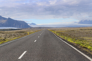 Road in the south of Iceland, on a summer day with blue sky