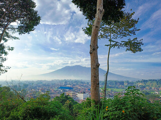 Obraz premium housing complex with a beautiful mountain background in the morning blue sky
