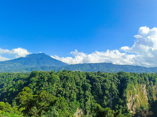 beautiful green hills and blue sky clouds