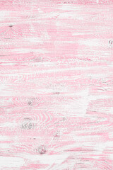 Obraz premium Light pink wooden background in cool tone. Wood texture with horizontal stripes and knots for wallpaper, graphic design, creativity. Top view, vertical orientation