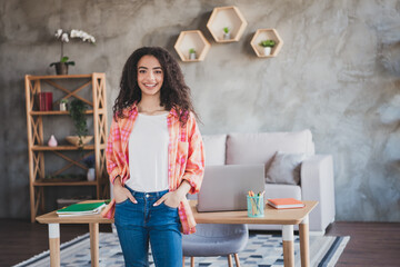 Photo of pretty cheerful lady wear checkered shirt smiling enjoying indoors room home house