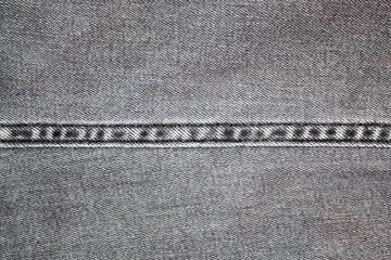 Gray denim,background texture. Denim silver,dark, original. Denim denim fabric,authentic texture,background.