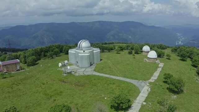 An aerial shot of the observatory in the mountains in summer. Special astrophysical observatory. Methods and instruments for astrophysical research.