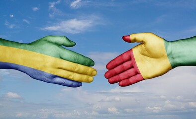 Republic of Guinea and Gabon country handshaking with flags, consensus concept international co-operation illustration