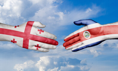 Costa Rico and Georgia country handshaking with flags, consensus concept international co-operation illustration