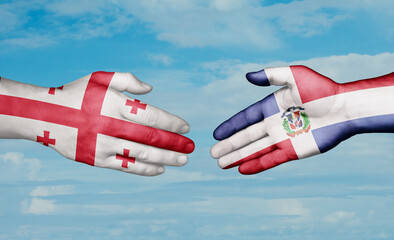 Dominican Republic and Georgia country handshaking with flags, consensus concept international co-operation illustration