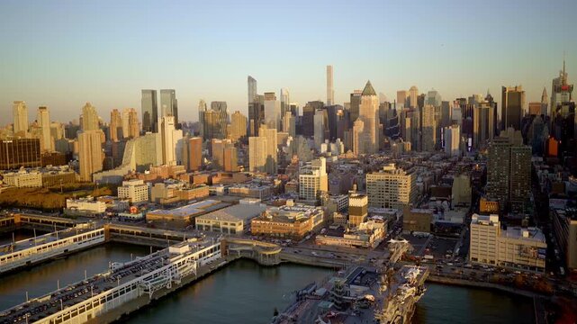 Aerial shot of Manhattan skyline by the Hudson River, encapsulating the vibrant citys essence