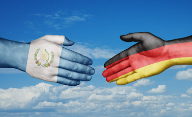 Germany and Guatemala country handshaking with flags, consensus concept international co-operation illustration