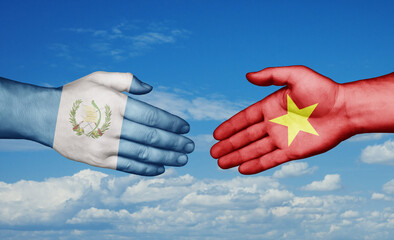 Vietnam and Guatemala country handshaking with flags, consensus concept international co-operation illustration