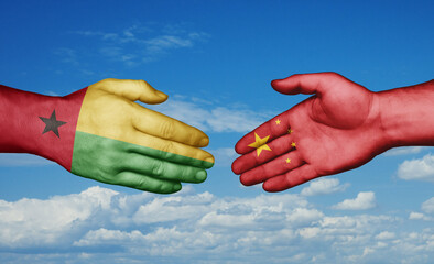 China and Guinea-Bissau country handshaking with flags, consensus concept international co-operation illustration