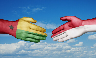 Indonesia and Guinea-Bissau country handshaking with flags, consensus concept international co-operation illustration