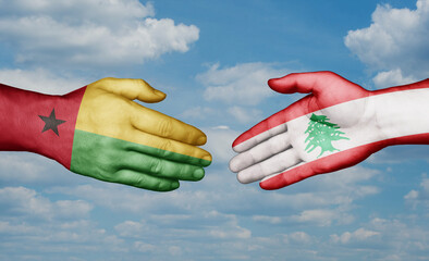 Lebanon and Guinea-Bissau country handshaking with flags, consensus concept international co-operation illustration