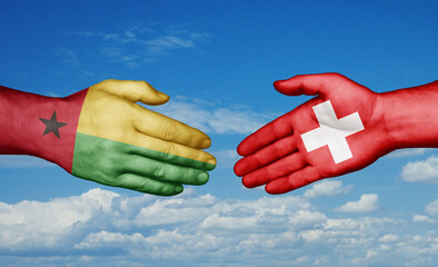 Switzerland and Guinea-Bissau country handshaking with flags, consensus concept international co-operation illustration