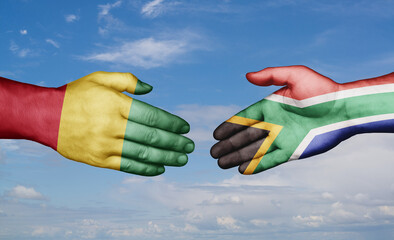 South Africa and  Guinea-Conakry country handshaking with flags, consensus concept international co-operation illustration