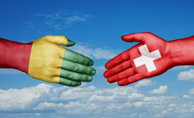 Switzerland and  Guinea-Conakry country handshaking with flags, consensus concept international co-operation illustration