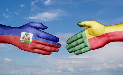 Benin and Haiti country handshaking with flags, consensus concept international co-operation illustration