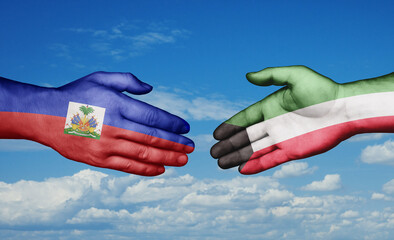 Kuwait and Haiti country handshaking with flags, consensus concept international co-operation illustration