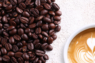 latte coffee and coffee beans on the table