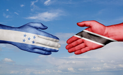 Trinidad and Tobago and Honduras country handshaking with flags, consensus concept international co-operation illustration