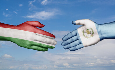 Guatemala and Hungary country handshaking with flags, consensus concept international co-operation illustration