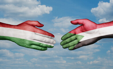 Sudan and Hungary country handshaking with flags, consensus concept international co-operation illustration