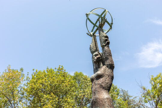 Monument In The Sea Garden, Sculpture Of A Woman Holding An Orb, Nucleus Of The Atom Above Her Head Tsarevo, Bulgaria - July 15 2024. Author Vassia Atanassova. Sightseeing. Horizontal Copy Space