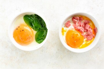 Eggs en cocotte (baked eggs) in ramekins