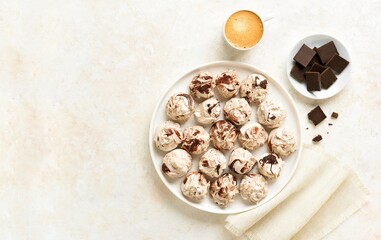 Chocolate meringue cookies and cup of coffee