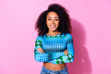 Photo portrait of lovely young lady crossed hands confident dressed stylish blue garment isolated on pink color background