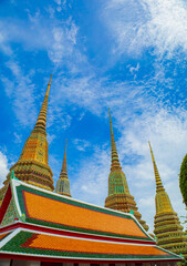 Fototapeta premium Picture of pagodas in Wat Pho in Bangkok, Thailand, one of Thailand's oldest temples.