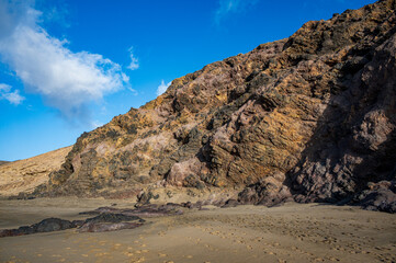 Ventifact rock formations caused by wind at La Pared Beach, Fuerteventura
