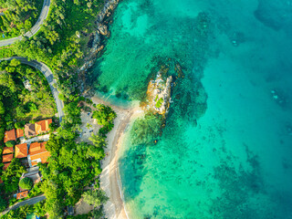aerial top view above small island in front of Yanui beach in low tide. Sand dunes in the separate sea. Sandbars form in the Separated Sea when the water level goes down. green sea white sand beach.