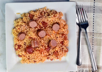 rice with diced tomatoes with hot dogs