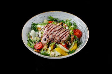 Duck Salad with Teriyaki Sauce on Black Background for Food Delivery Menu