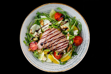 Duck Salad with Teriyaki Sauce on Black Background for Food Delivery Menu