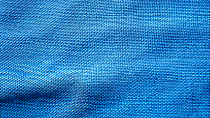 blue textured fabric close-up, soft surface, minimalist textile design, background