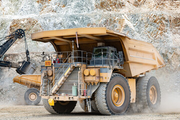 Hugh dump truck and electric rope shovel at a copper mine in Chile