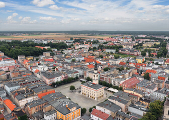 Obraz premium Aerial summer skyline cityscape of Leszno, Poland. Panoramic view of the old town market (Rynek) square and town hall (Ratusz)