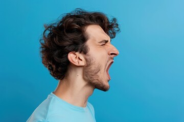 Fototapeta premium Portrait of Annoyed Man in Royal Azure with Natural Light