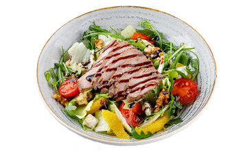 Salad with duck, oranges, and unagi sauce on a white background. isolate. for food delivery menus