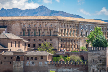 Fototapeta premium Palacio Carlos V in Granada Andalusia Spain with Beautiful Mountain View